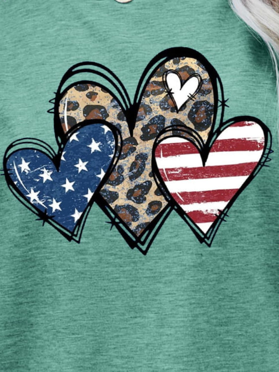 Teal t-shirt with three hearts: one leopard print, one American flag, one red and white stripes.