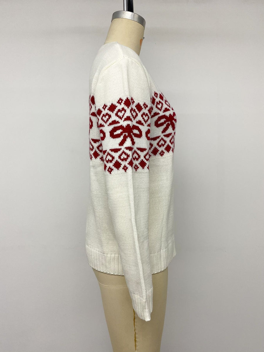 Bow Pattern Long Sleeve Christmas Sweater in White with ribbed cuffs