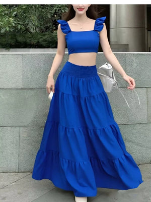 Royal blue ruffled crop top and tiered maxi skirt set with smocked waist.
