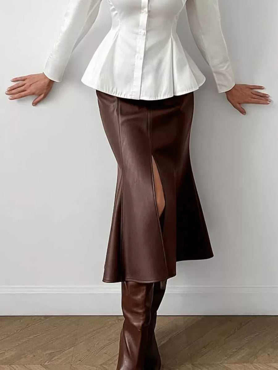 50% PU 47% Polyester 3% Spandex Care instructions: Machine wash cold midi skirt in Brown with flared silhouette
