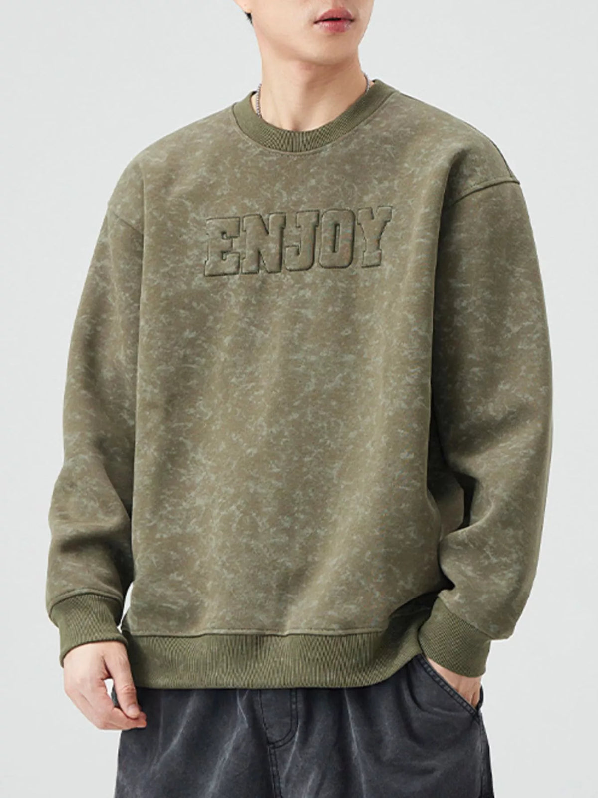 Men's Army Green long-sleeve sweatshirt with embossed "ENJOY" graphic and marbled pattern.