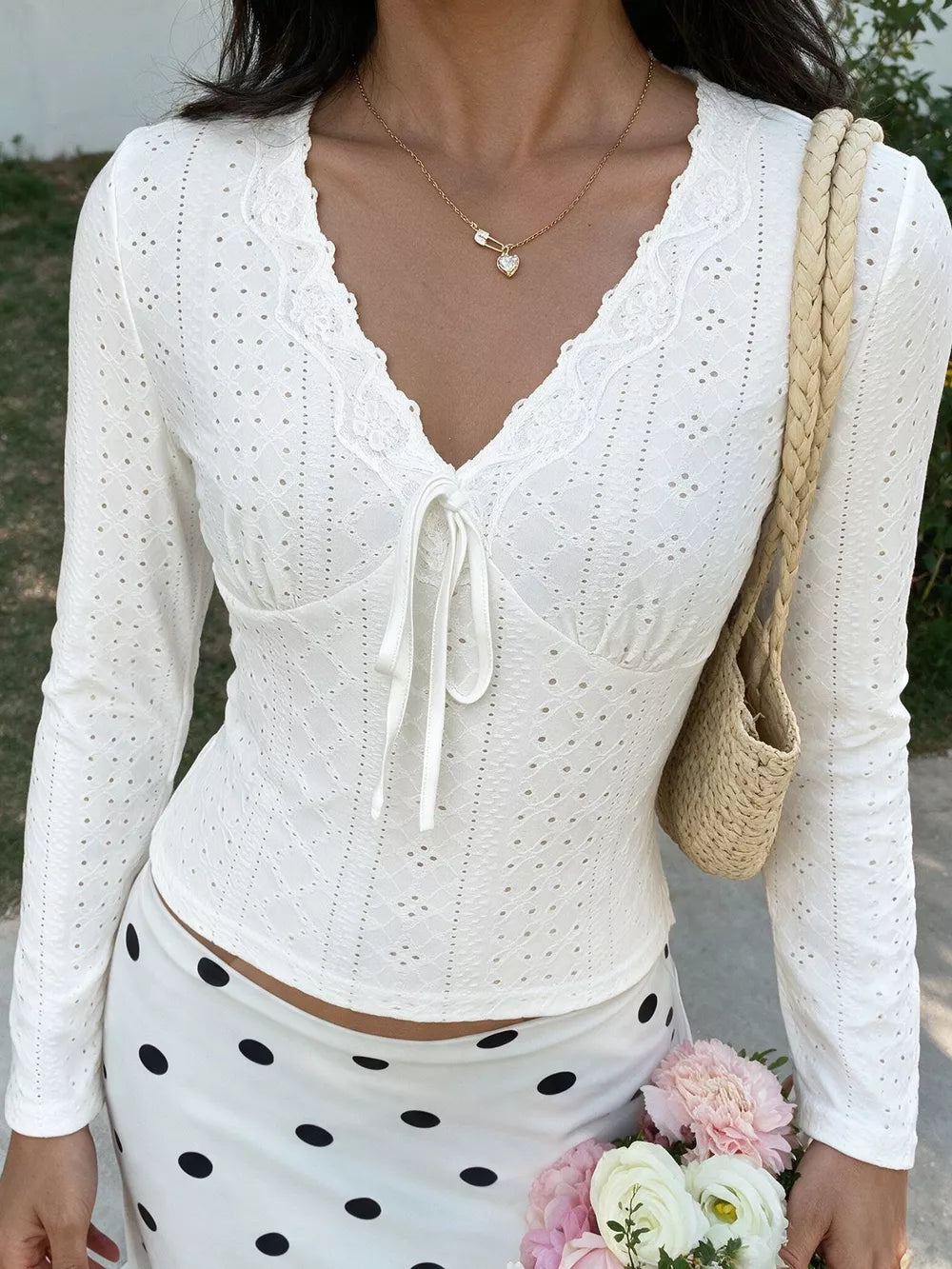 white t-shirt with eyelet and v-neck