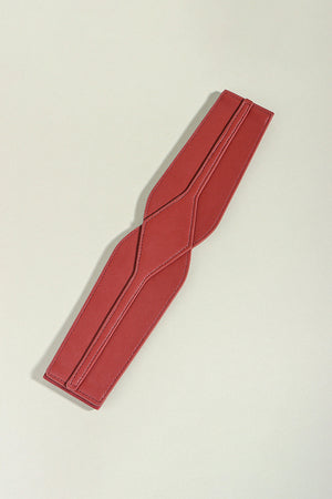 Burgundy elastic belt with sculpted waist detail and stitched accents
