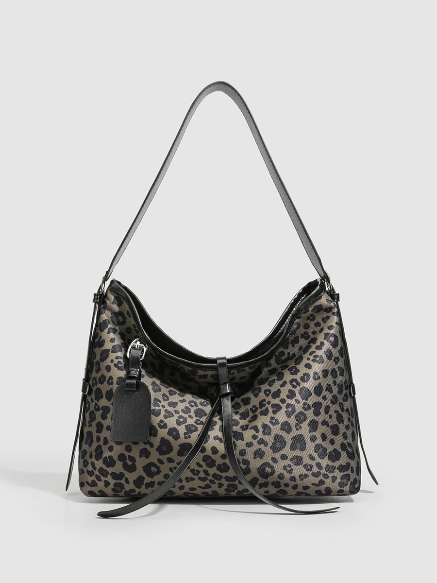 shoulder bag in tan featuring shoulder strap and hobo fit