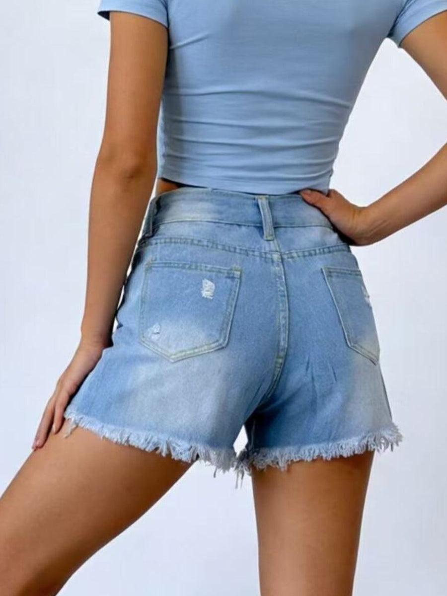 Light blue distressed denim shorts with frayed hem and high waist.