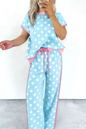 Polka dot loungewear set with contrast trim, drawstring waist, and wide leg pants.