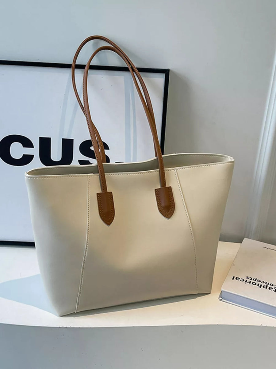 Chic structured white PU leather tote bag with brown handles and clean silhouette