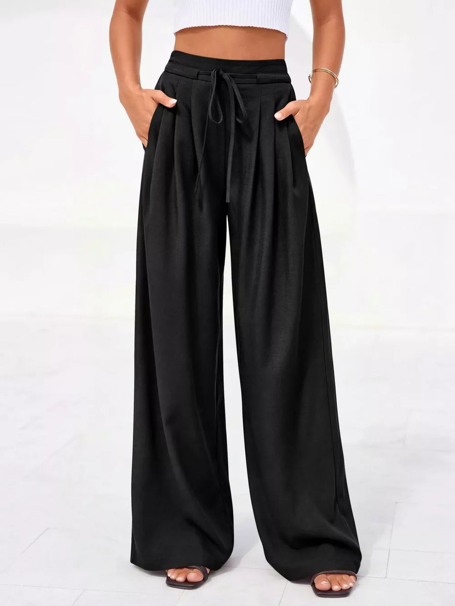Black high-waisted pleated wide-leg pants with drawstring and pockets