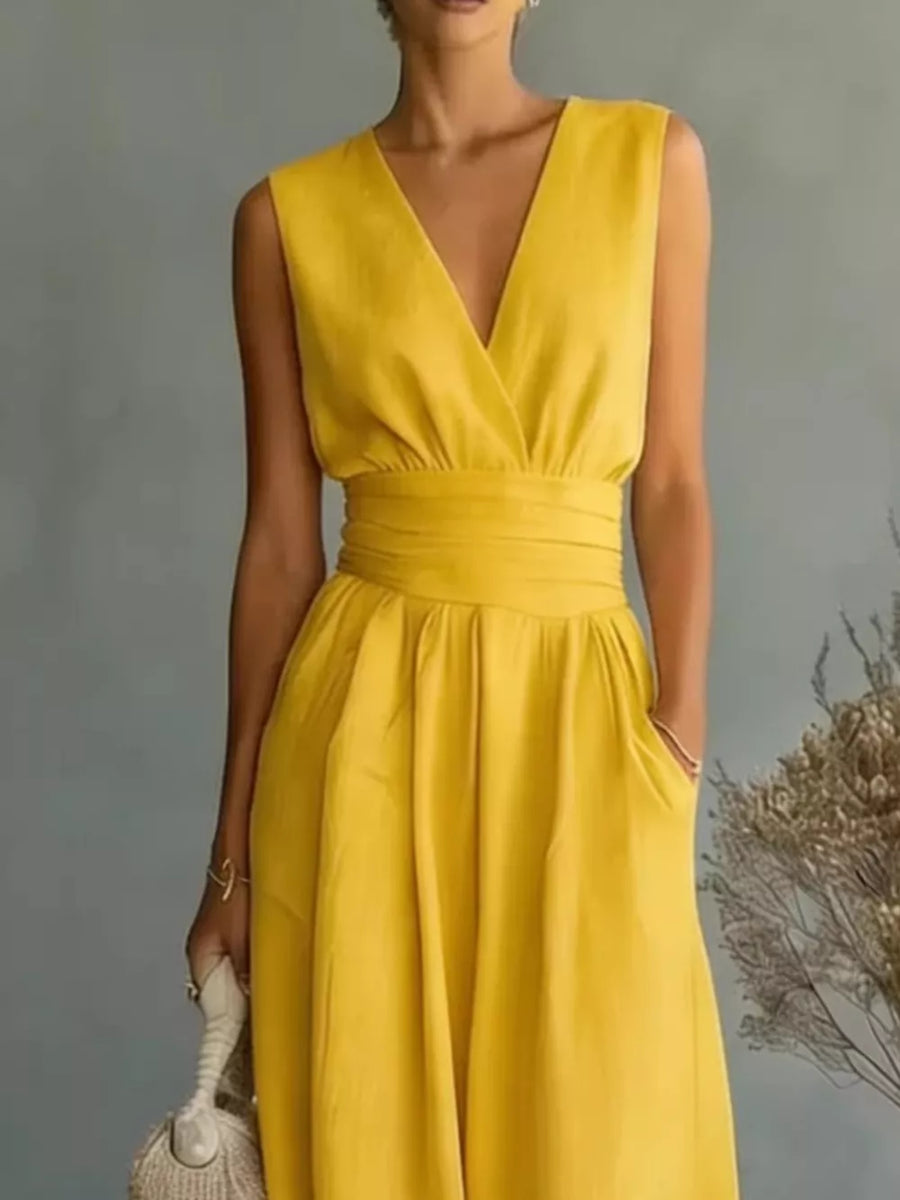 Yellow sleeveless V-neck midi dress with wrap waist and pockets
