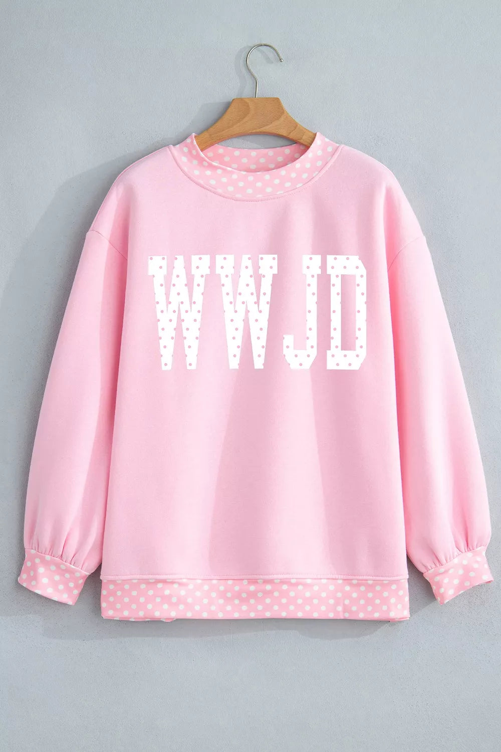 light pink sweatshirt with hip-length and pullover