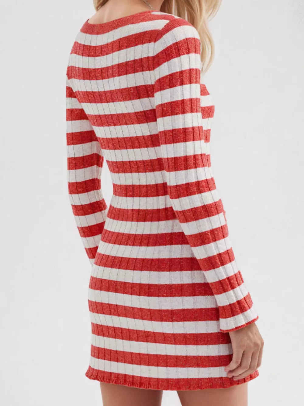 white sweater dress featuring ribbed and striped
