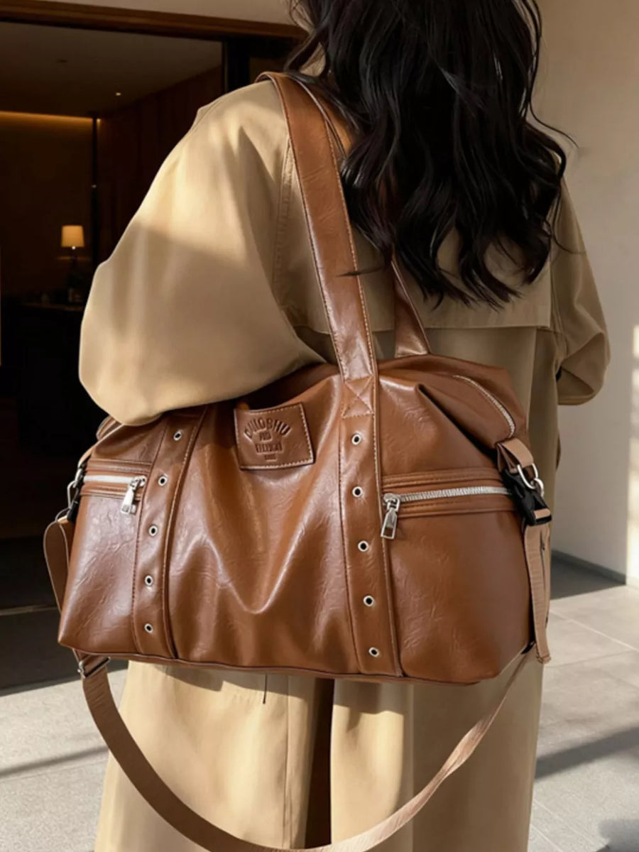 Chic brown pu leather shoulder bag with adjustable strap and silver hardware details