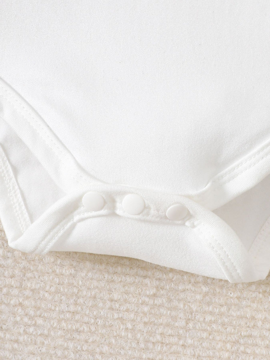 White baby bodysuit with snap closure detail