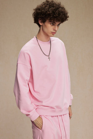 Pink crewneck sweatshirt with long sleeves