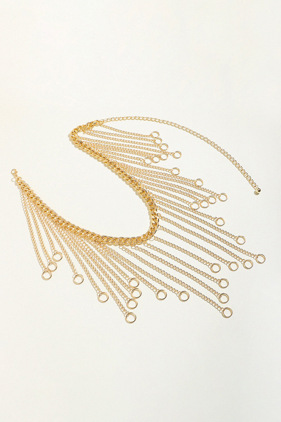 Gold chain belt with cascading fringe and ring details