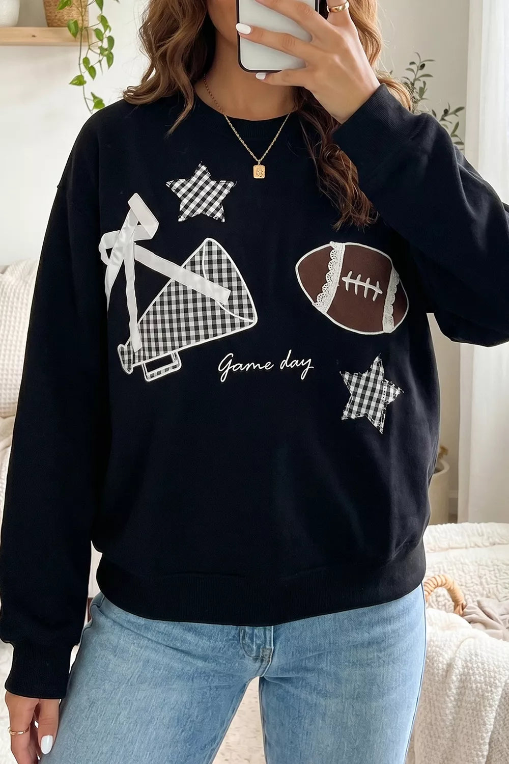 red sweatshirt with embroidered details and long sleeve