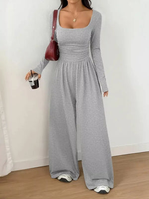 jumpsuit in light gray featuring ruched and wide-leg fit