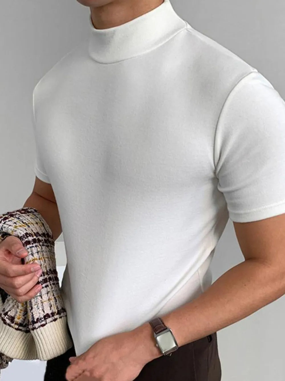 White short sleeve mock neck tee with a fitted silhouette.