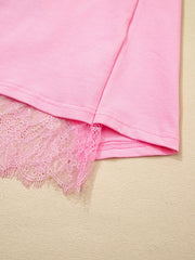 Pink cotton blend oversized tee with delicate lace trim detail.