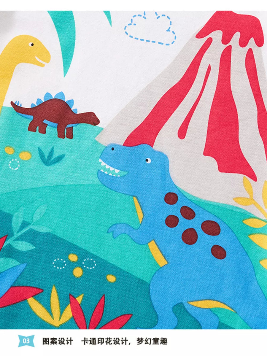Fabric with a blue dinosaur, yellow dinosaur, brown dinosaur, and red volcano print.