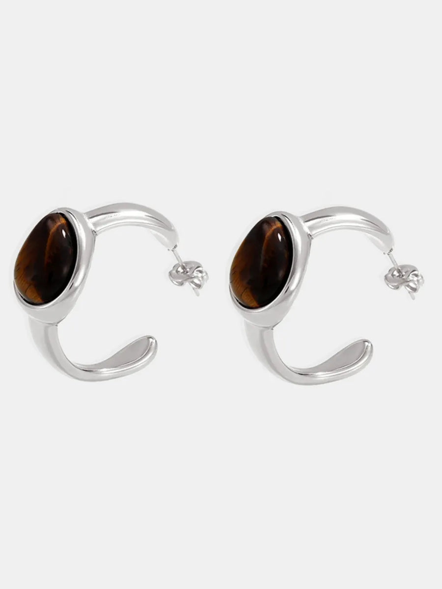 Silver hoop earrings with oval tiger's eye stones
