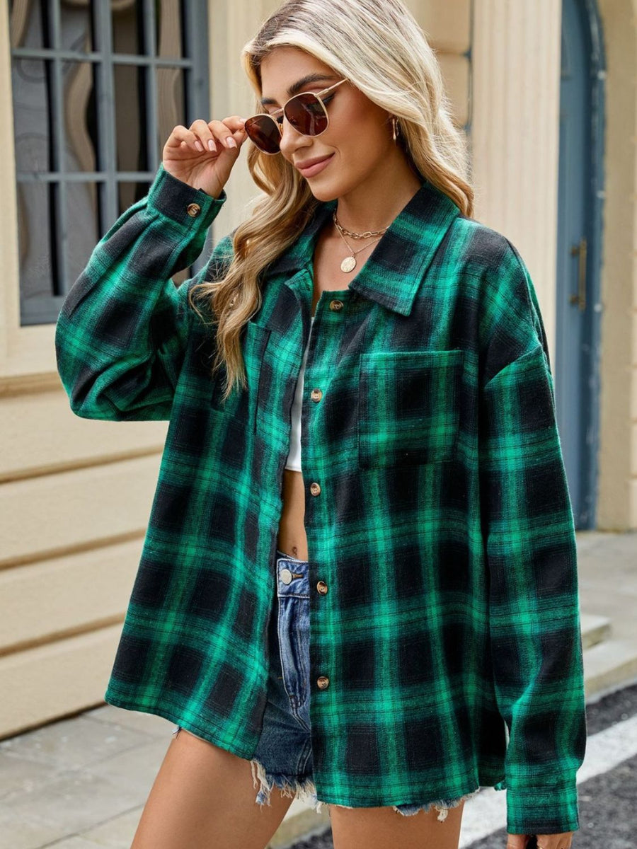 Dark Green and Black plaid collared long sleeve button-up shirt with chest pockets.