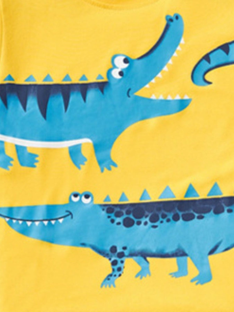 Yellow toddler tee with a playful blue crocodile graphic print.