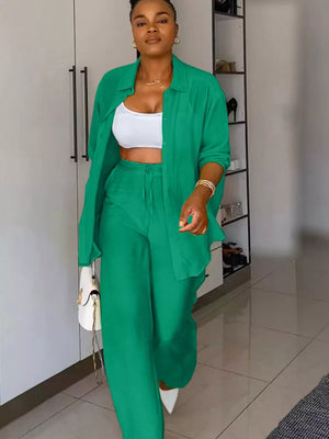 Green tie-front collared button-down shirt and wide-leg pants set with drawstring waist.