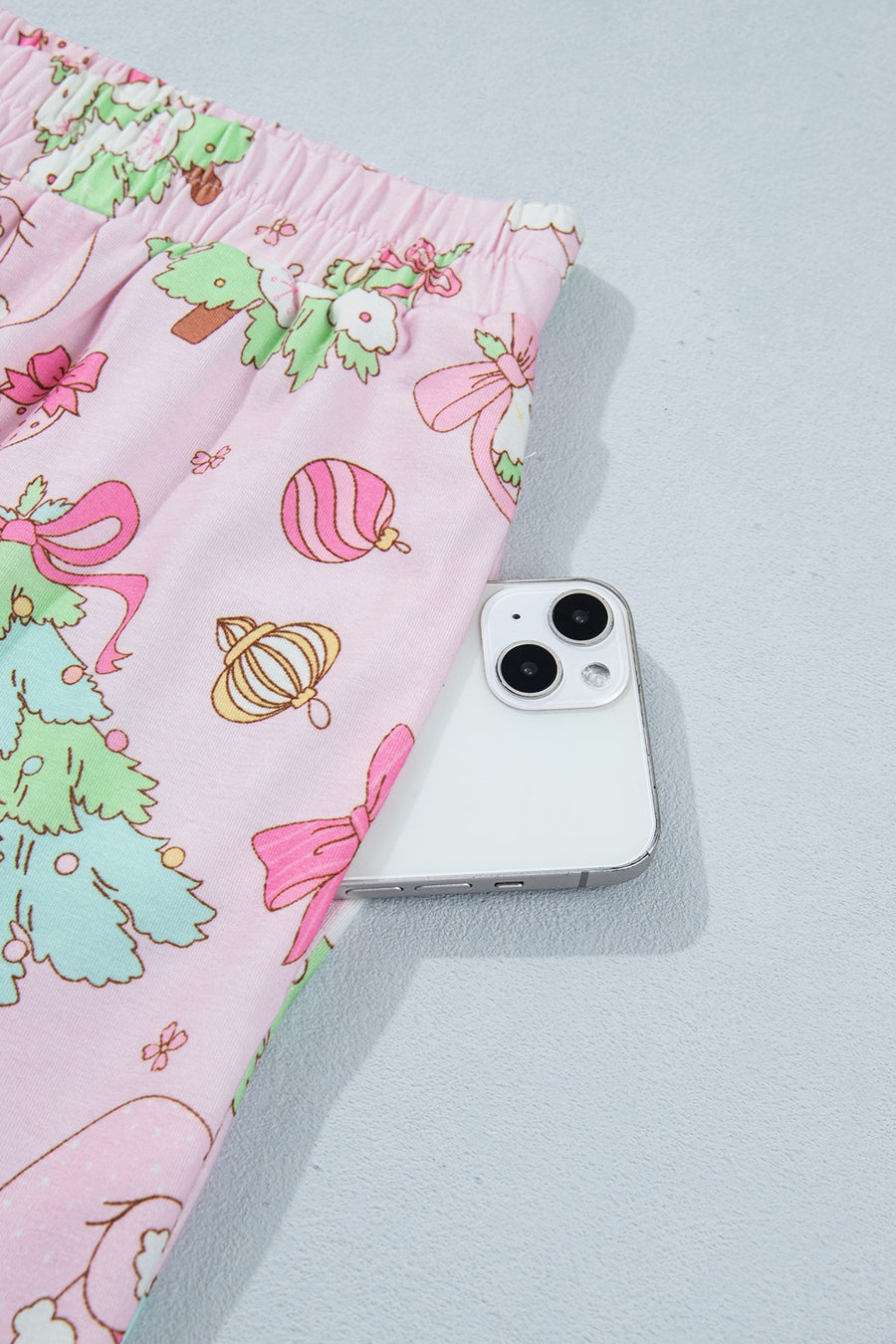 light pink pajama set with half-button, elastic and christmas print