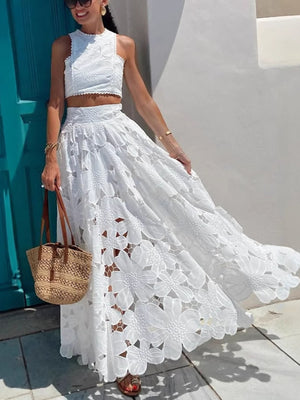 White floral lace two-piece set with cutout crop top and maxi skirt