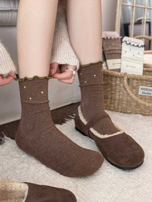 White socks featuring ribbed knit and ditsy floral