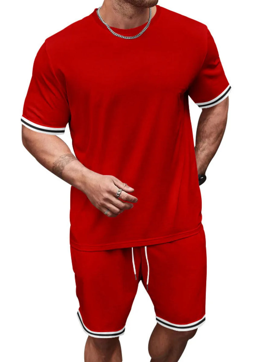 Red t-shirt and shorts set with white and black striped trim on sleeves and hem.