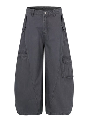 Grey wide-leg cargo pants with multiple pockets and contemporary stitching.