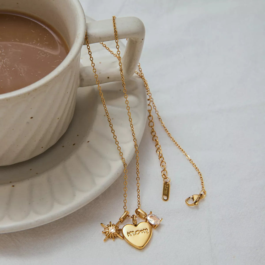 Gold heart charm necklace with mom engraving and crystal accents