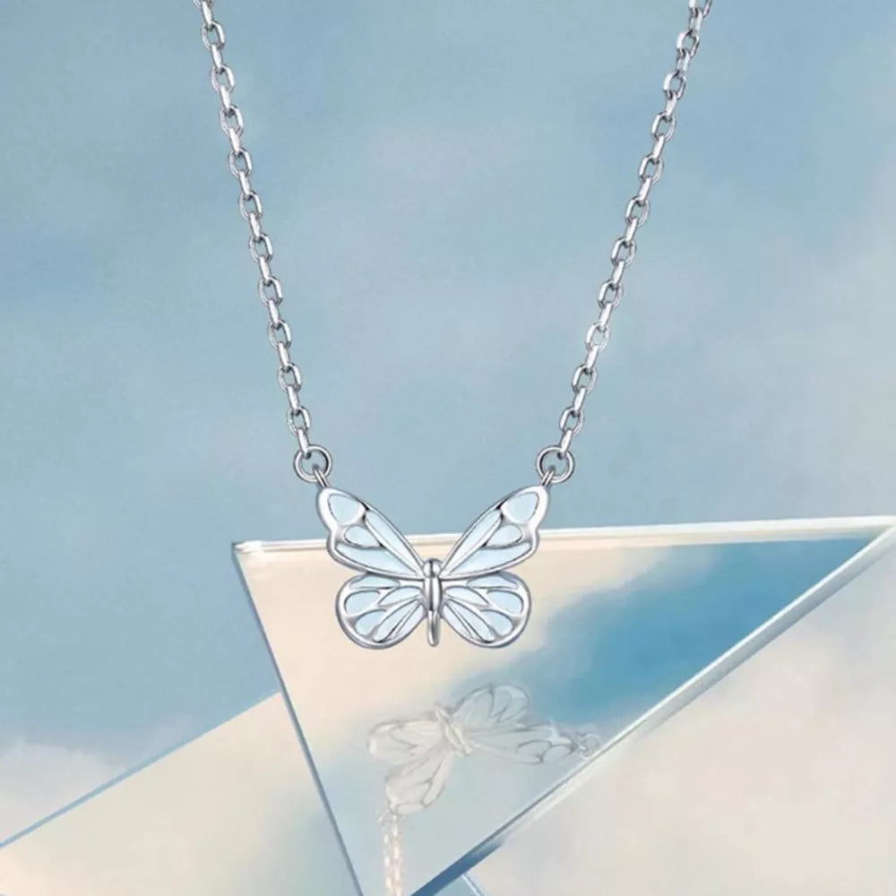 necklace in silver featuring butterfly pendant and straight fit