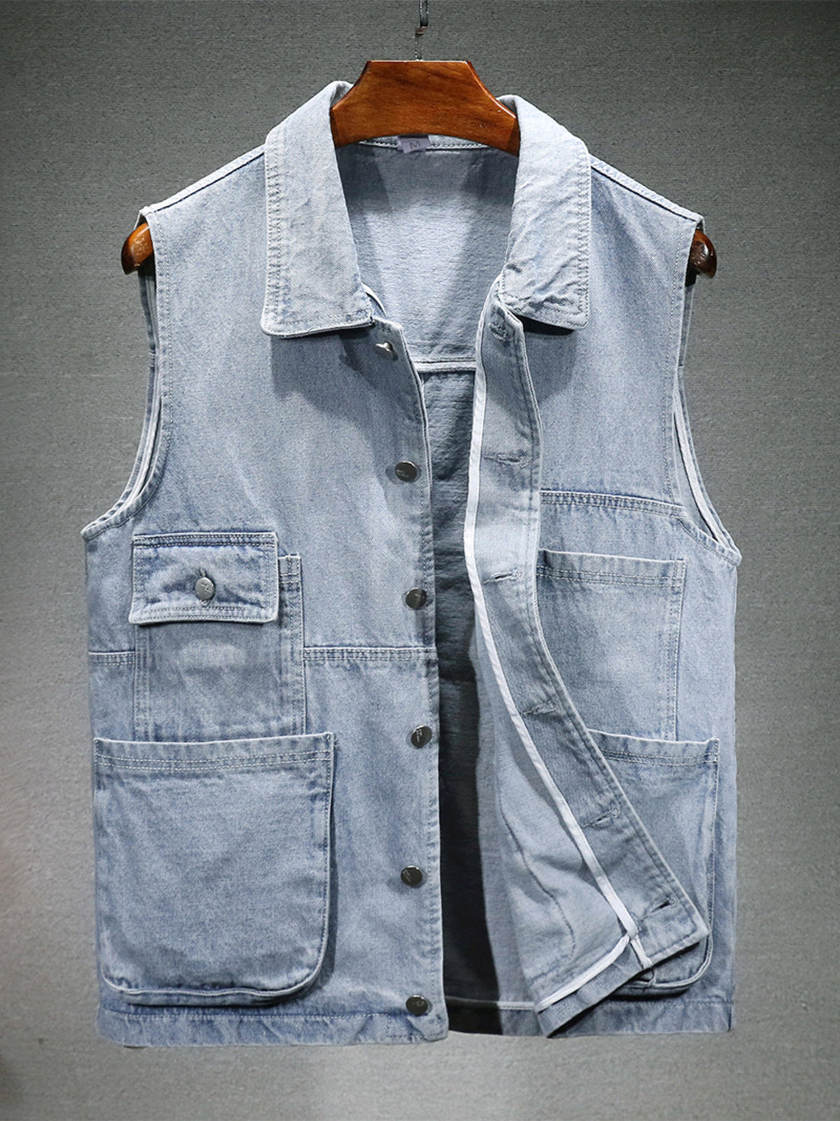 Light blue denim vest for men with button front and chest pockets