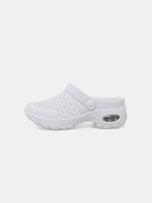 White air cushion mesh slingback clogs with a clear heel detail.