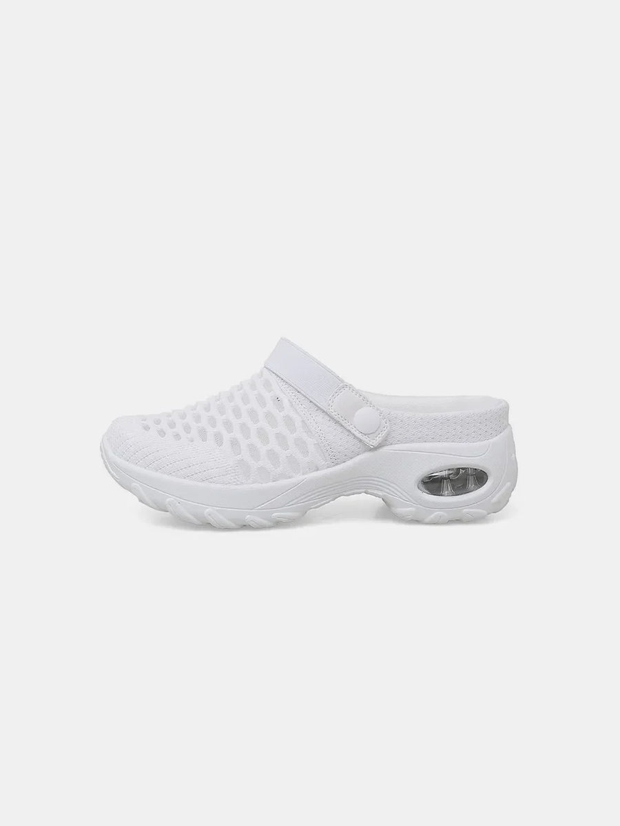 White air cushion mesh slingback clogs with a clear heel detail.