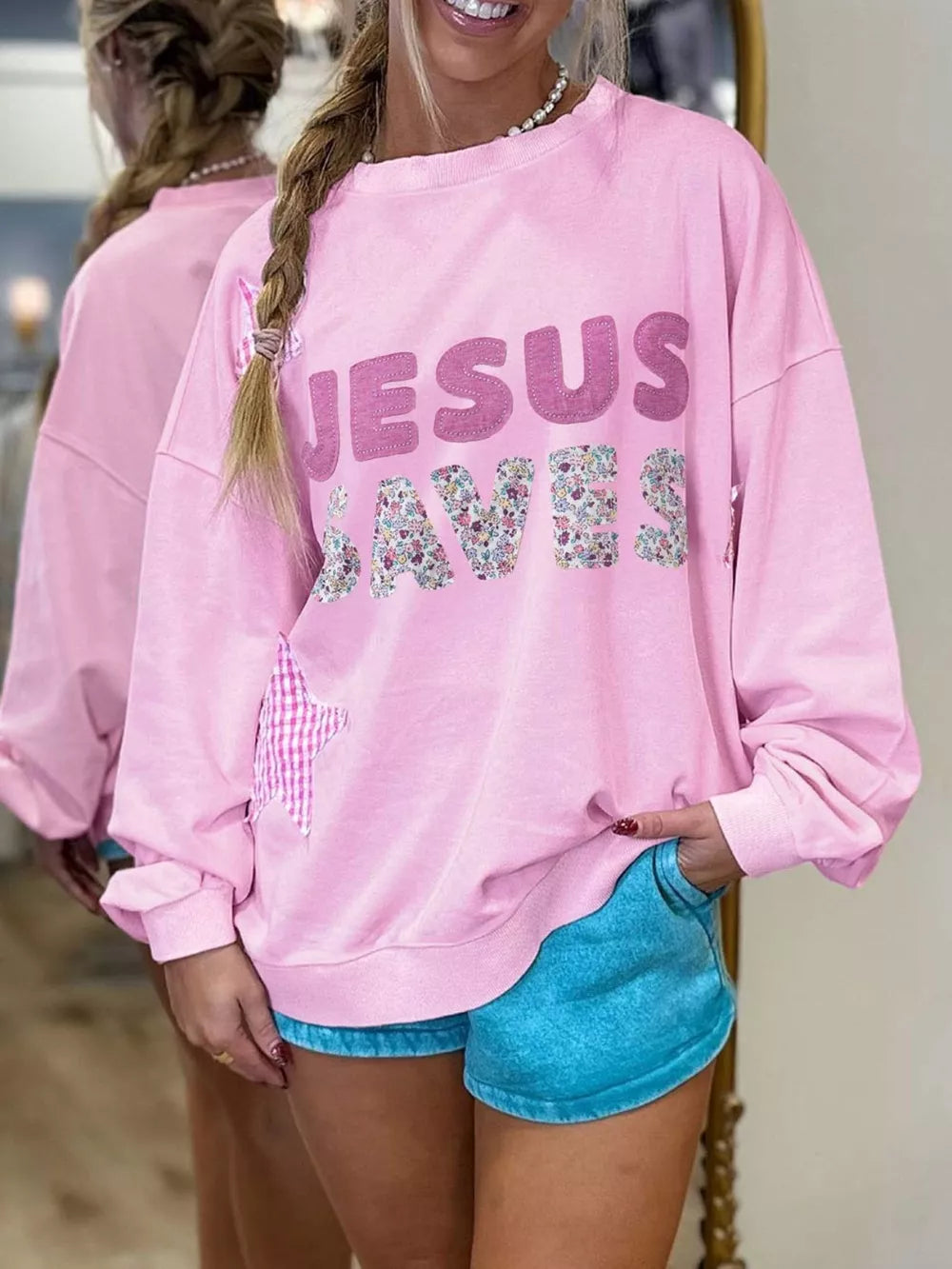 sweatshirt in light pink featuring chenille patch and oversized fit