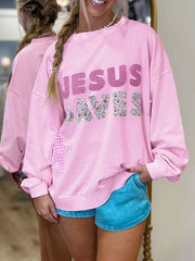 sweatshirt in light pink featuring chenille patch and oversized fit