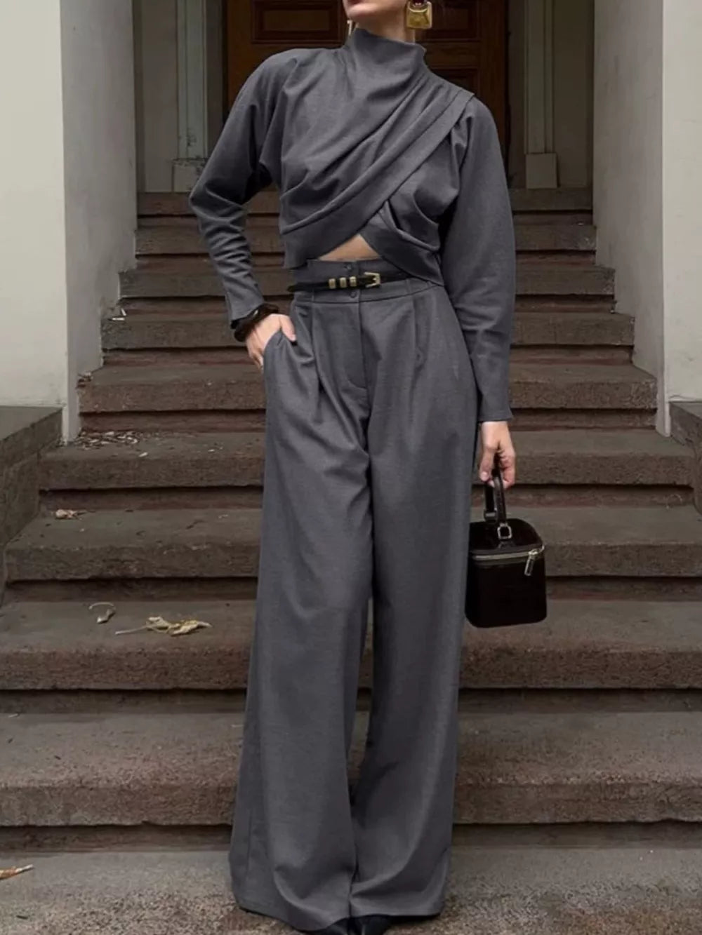80% Polyester 20% Viscose Care instructions: Machine wash cold two-piece set in Gray with relaxed silhouette