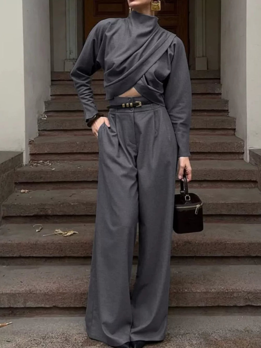 80% Polyester 20% Viscose Care instructions: Machine wash cold two-piece set in Gray with relaxed silhouette
