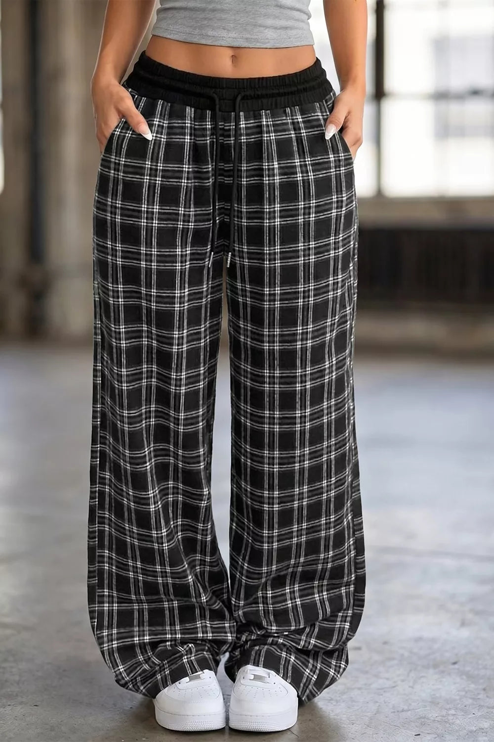 black wide-leg pants with full-length and drawstring