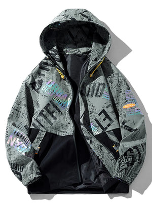 Plus size hooded parka in dark gray with abstract text print and black paneling.