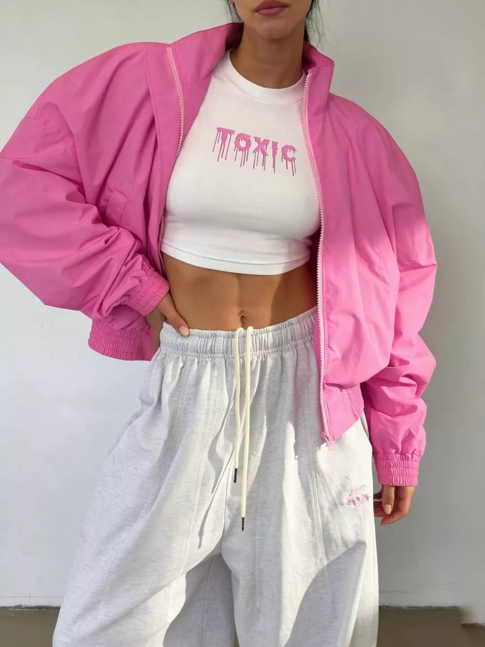 bomber jacket in hot pink featuring pocketed and oversized fit