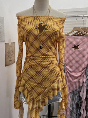 Yellow plaid asymmetrical ruffle hem t-shirt with star cutout detail.