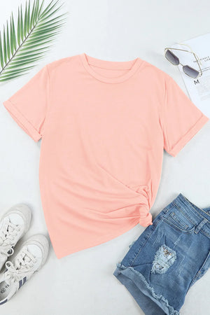 Watermelon pink basic t-shirt with rolled sleeves and a knotted hem.