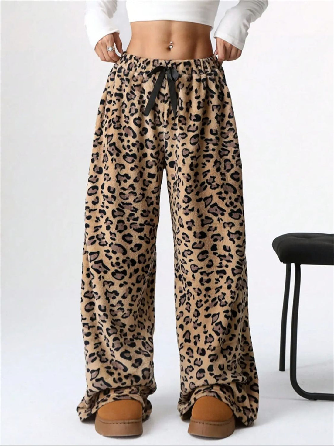 Leopard print lounge palazzo trousers with drawstring waist and wide leg.