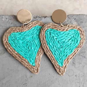 Aqua woven heart statement earrings with gold disc detail.