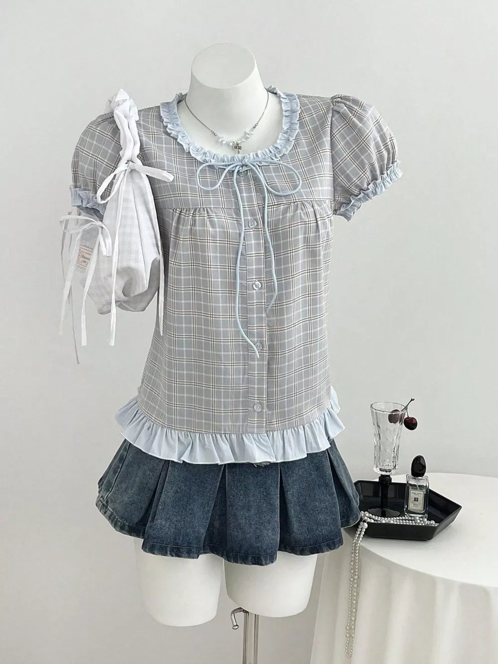 100% polyester Care instructions: Machine wash cold blouse in Blue with A-line silhouette